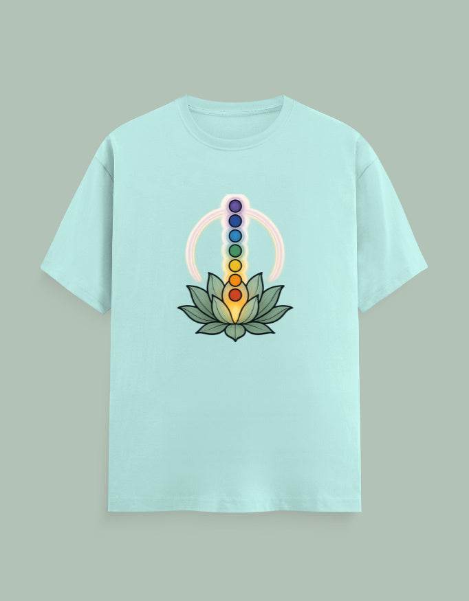 Light blue Chakra Mandala Yoga Tee featuring colorful chakra symbols above a lotus flower graphic