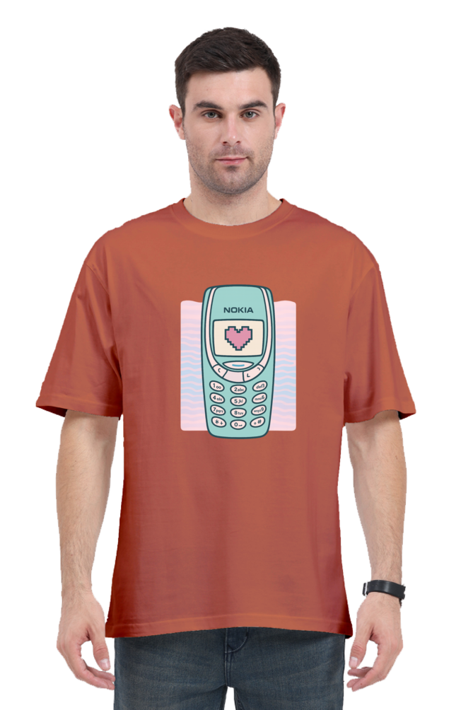 Y2K vintage cell phone Oversized t-shirt in rust with retro Nokia phone graphic worn by man