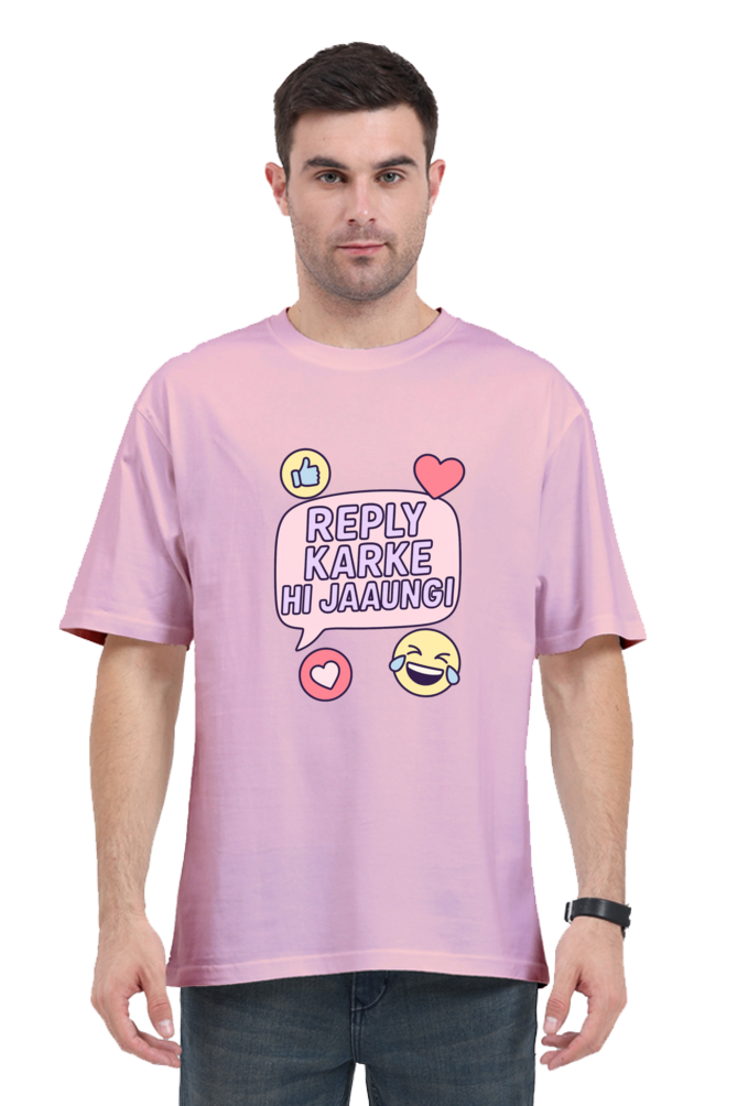 Man wearing a pink Funny Reply Oversized T-Shirt 240 GSM with social media icons and Hindi text design