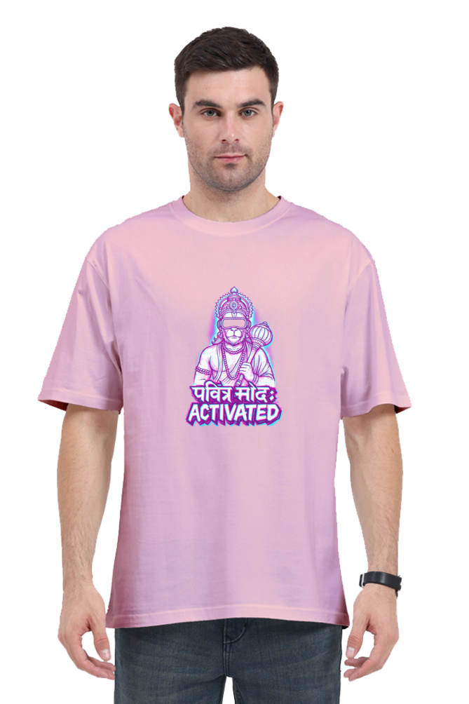 Man wearing a pink Hanuman graphic oversized t-shirt with text and illustration on front