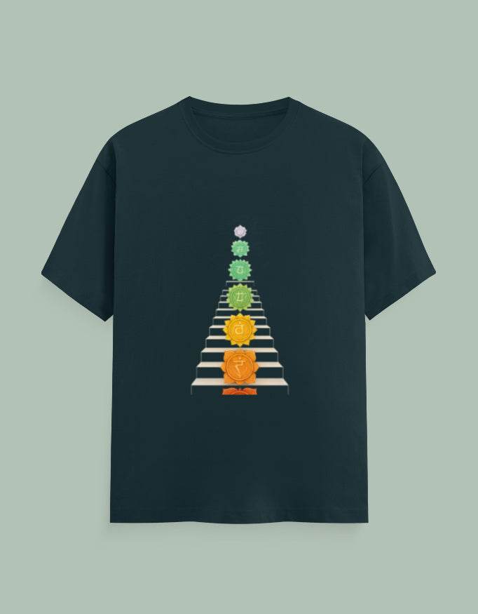 SkyBi Shirts Moksha Chakra Yoga Tee in black featuring colorful chakra symbols arranged vertically