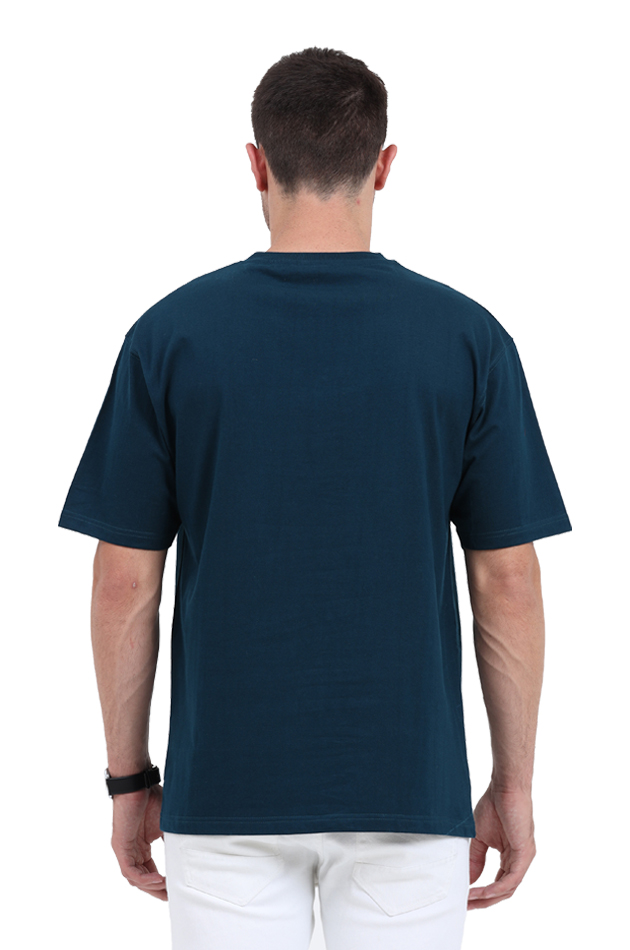 Back view of a man wearing a dark blue oversized cyber t-shirt with short sleeves