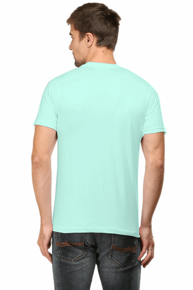 Back view of a man wearing a light green Radiant Buddha Yoga Tee by SkyBi Shirts with short sleeves