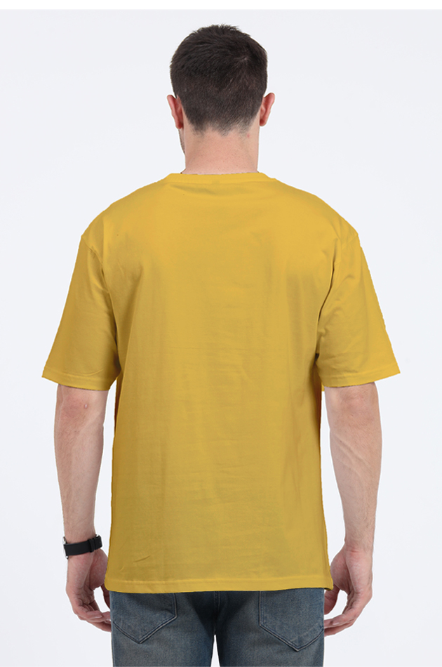 Back view of a man wearing a mustard yellow rickshaw oversized t shirt with short sleeves and relaxed fit