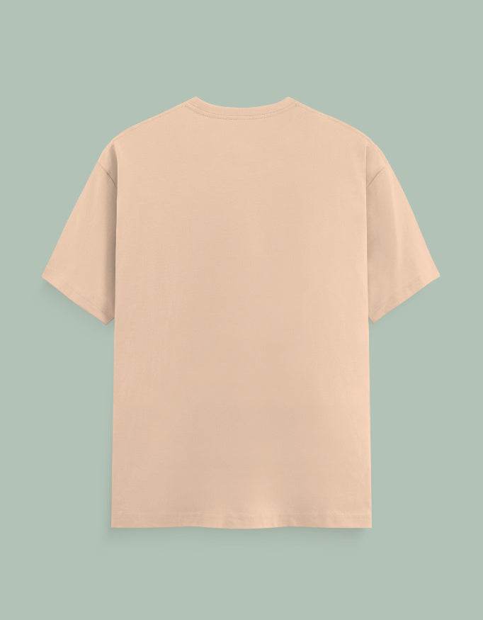 Back view of a beige SkyBi Shirts Chakra Dancer t-shirt on a plain background