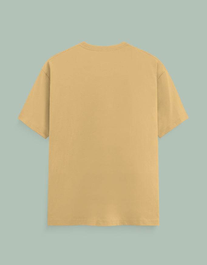 Back view of plain beige SkyBi Shirts Chakra Dancer short sleeve t-shirt on gray background