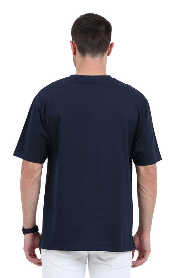 Back view of man wearing navy blue Y2K cherry soda Can oversized t-shirt with short sleeves