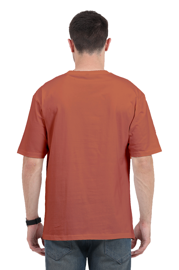 Back view of a man wearing a rust-colored Y2K Desi Brat oversized t-shirt from SkyBi Shirts