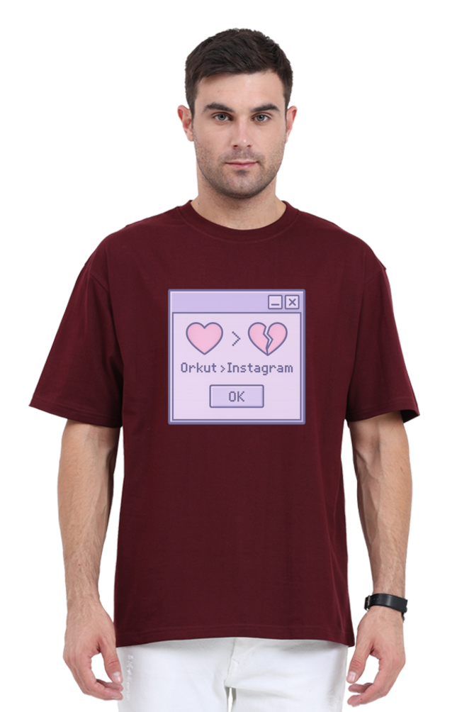 Man wearing maroon Y2K Orkut Oversized T-Shirt with retro graphic comparing Orkut and Instagram
