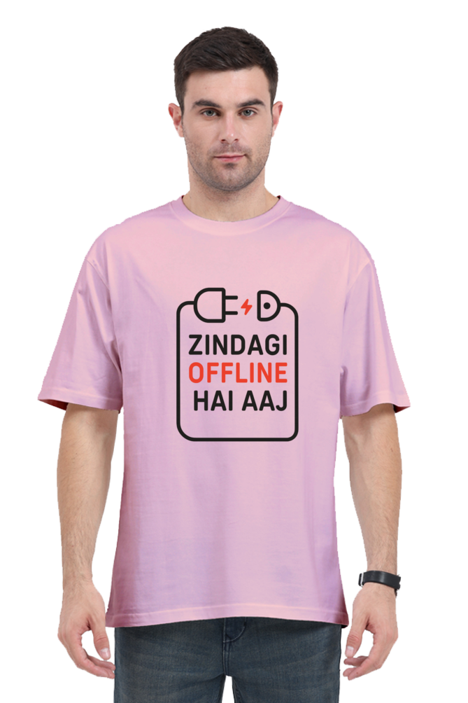 Male model wearing a pink Zindagi Offline oversized t-shirt by SkyBi Shirts with graphic design